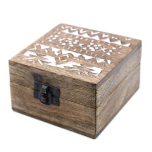 Decorative white washed wooden box with Slavic design, perfect for storage.