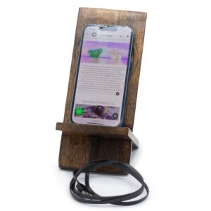 Unique wooden phone stand featuring a carved Buddha design for mindful living.