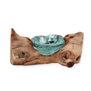 Handcrafted molten glass candle holder on a wooden base, perfect for home decor.