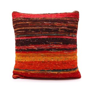 Rich red rag rug cushion covers adding warmth to your home decor.