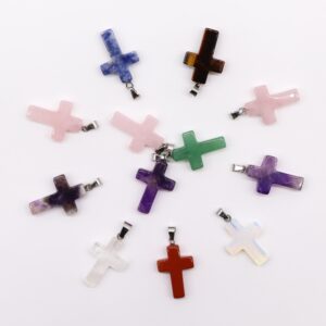 Assorted gemstone crosses pendants in various colours and designs.