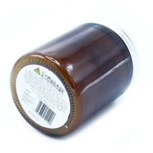 Unlabelled aromatherapy candle designed to promote positive vibes in any space.