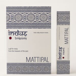 Hand-rolled Mattipal incense sticks in a decorative setting.