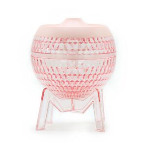 Stylish pink humidifier with colour-changing down light for modern homes.