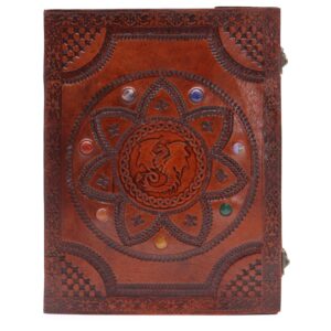 Large tomb book featuring a dragon mandala and chakra stones design.