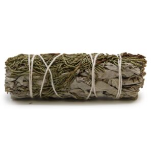 Smudge stick made of white sage and juniper for cleansing spaces.