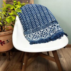 Handmade indigo throw featuring Seedha Arrows pattern, perfect for home decor.