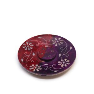 Floral soapstone disc incense holder designed for five sticks.