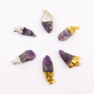 Assorted gold and silver plated amethyst gemstone pendants displayed elegantly.