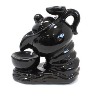 Elegant backflow incense burner designed as a tea pot for calming aromas.