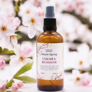 Sakura Essence room spray in a stylish bottle, perfect for home fragrance.