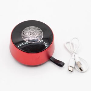 Compact mini speaker with red mandala LED lighting effect for vibrant atmosphere.