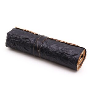 Elegant black rolled leather travel notebook with 96 pages and a stylish design.