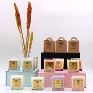 Chunky recycled glass jar candle with natural soybean wax, emitting a warm glow.