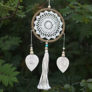 Handmade vegan dream catcher from Bali with rattan and wooden beads.