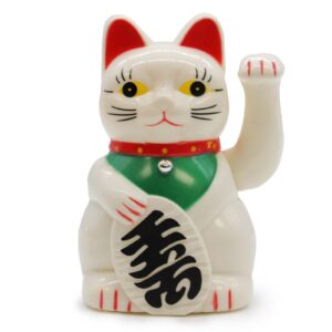 White Money Cat figurine waving to attract good fortune and wealth.