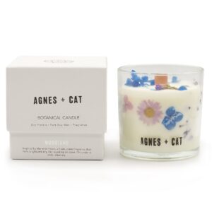 Botanical soy wax candle in a glass jar with a fresh Moorland fragrance.