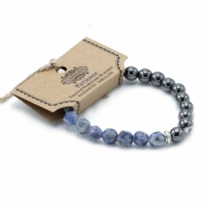 Faceted sodalite bracelet with sparkling beads reflecting light.