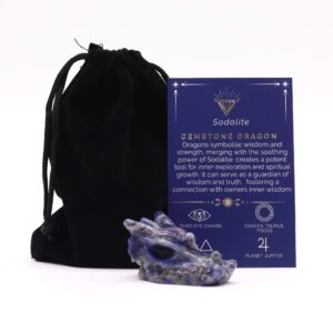 Small dragon head sculpture made from sodalite gemstone.