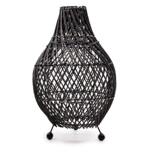 Unique black rattan table lamp with intricate patterns, perfect for home decor.