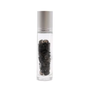 Black tourmaline essential oil roller bottle with silver cap and gemstones inside.