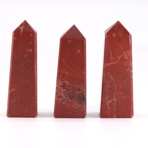Polished Red Jasper Gemstone Obelisk Point with warm earthy tones.
