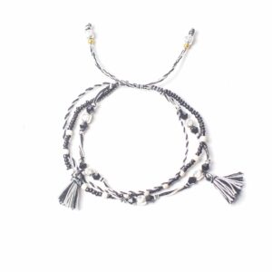 Handcrafted Temple String Bracelet symbolising balance with black and white beads.