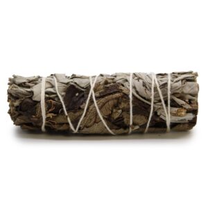 Smudge stick made from white sage and black sage for cleansing spaces.