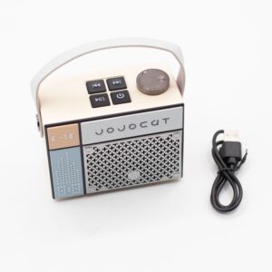 Compact JojoCat C10 Retro Radio Speaker with vintage design and carry handle.