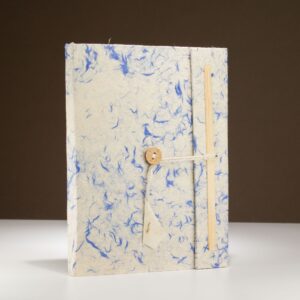Large Lokta notebook with blue cotton fibres and a rustic string tie.