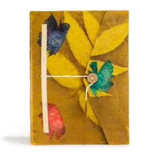 Large mustard brown notebook with bold floral design and bookmark included.