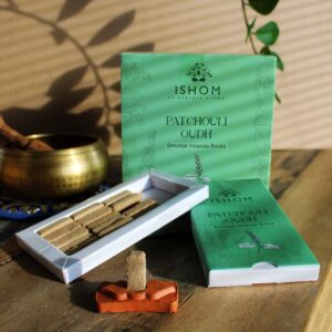 Natural incense smudge bricks and terracotta burner with patchouli wood scent.
