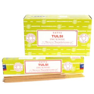 Hand rolled Satya Incense sticks in a vibrant packaging, perfect for home fragrance.