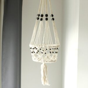 Large single beaded macrame pot holder for indoor plants.