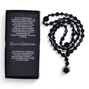 Necklace featuring black lava stones and polished beads, symbolising renewal.