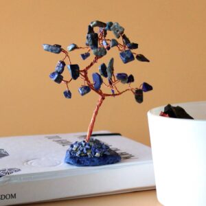 Sodalite gemstone tree on a blue agate base, showcasing 35 stones in a serene arrangement.