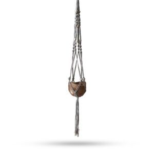 Beige macrame pot holder with beads, perfect for indoor plants.