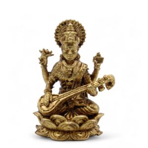 Miniature brass statue of Saraswati on a lotus base, holding a veena.
