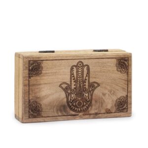 Black engraved Hamsa design on a square box for home decor or gifting.