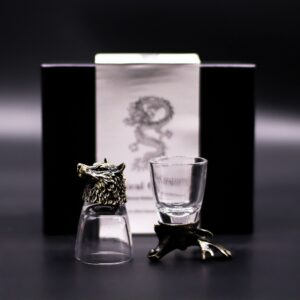 Set of six antique bronze shot glasses featuring wild forest creatures.