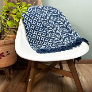 Handmade indigo throw featuring intricate Namoona pattern, perfect for home decor.