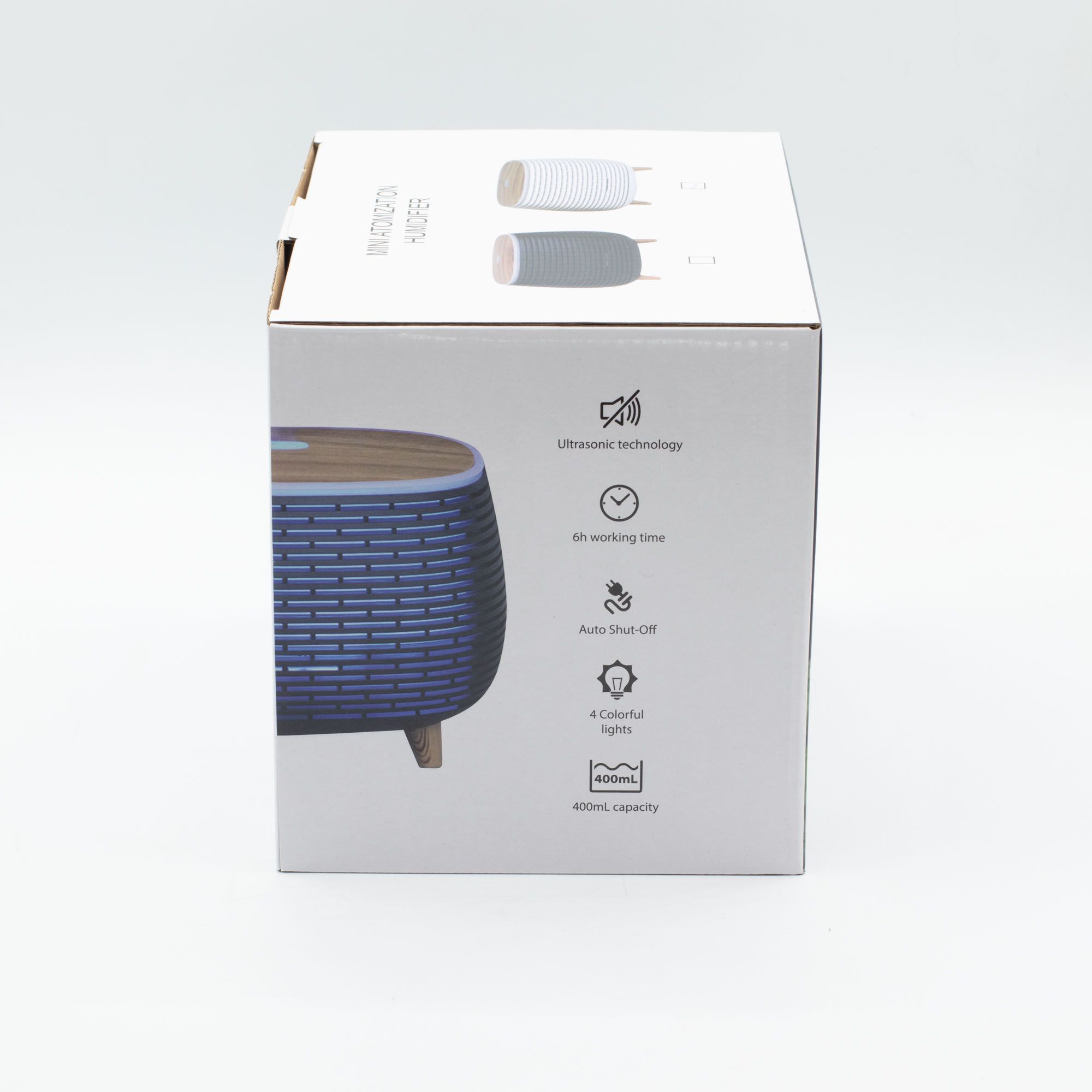 Futuristic ribbed aroma diffuser with wood-effect top and colour-changing light.