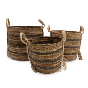 Set of three large baskets made from banana leaf and seagrass in earthy brown tones.