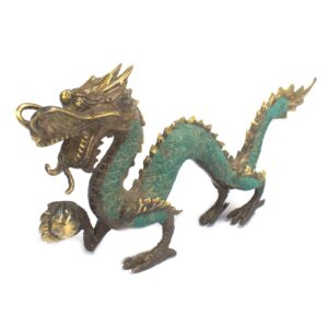 Brass Fengshui dragon ornament with ball, 27cm tall, for home decor.