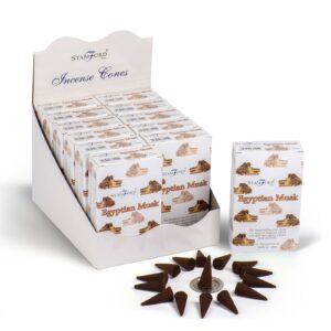 Egyptian Musk incense cones in a decorative setting for aromatic enjoyment.