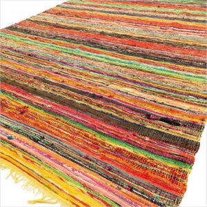 Luxury yellow rag rug, perfect for adding warmth to any space.