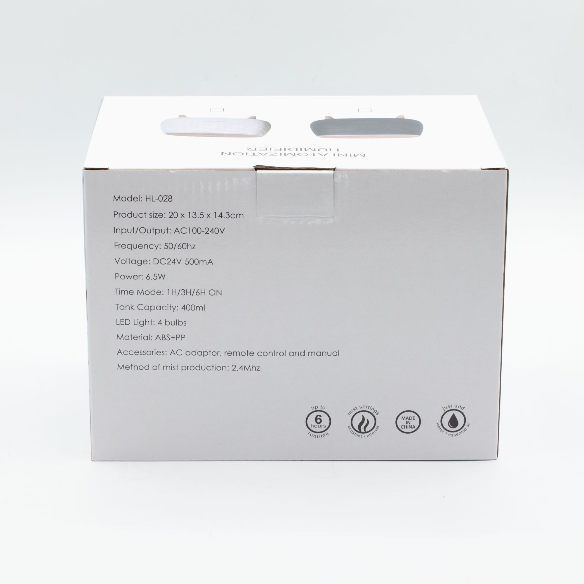 Futuristic ribbed aroma diffuser with colour-changing light and wood-effect top.