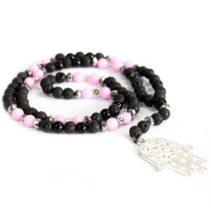 Lava stone necklace featuring pink and black beads with silver flowers and hematite accents.