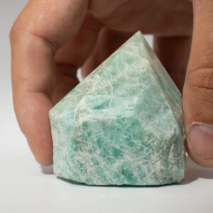 Polished Indian Amazonite points showcasing soft turquoise-green tones.
