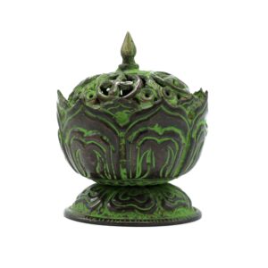 Handcrafted brass incense burner with verdigris finish and lotus design.